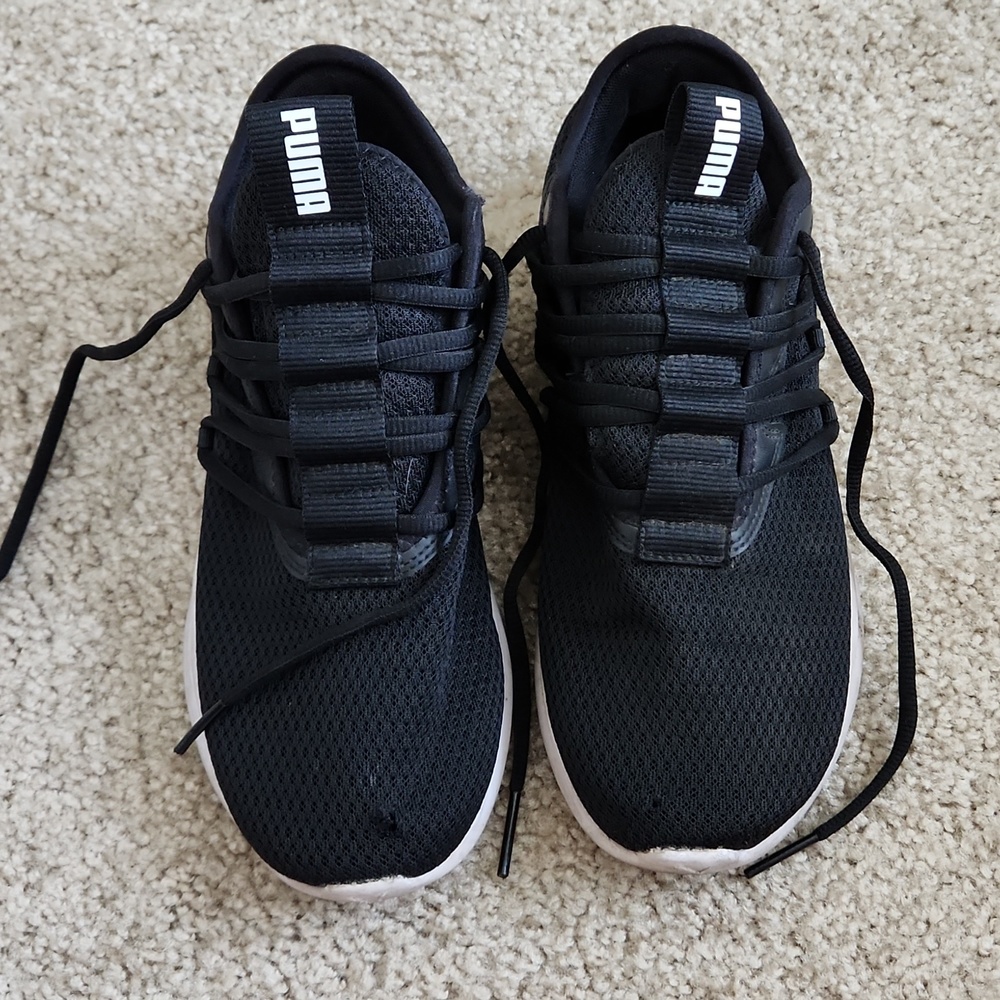 Black Puma running shoes
